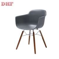 Modern restaurant plastic armrest chair with wood legs